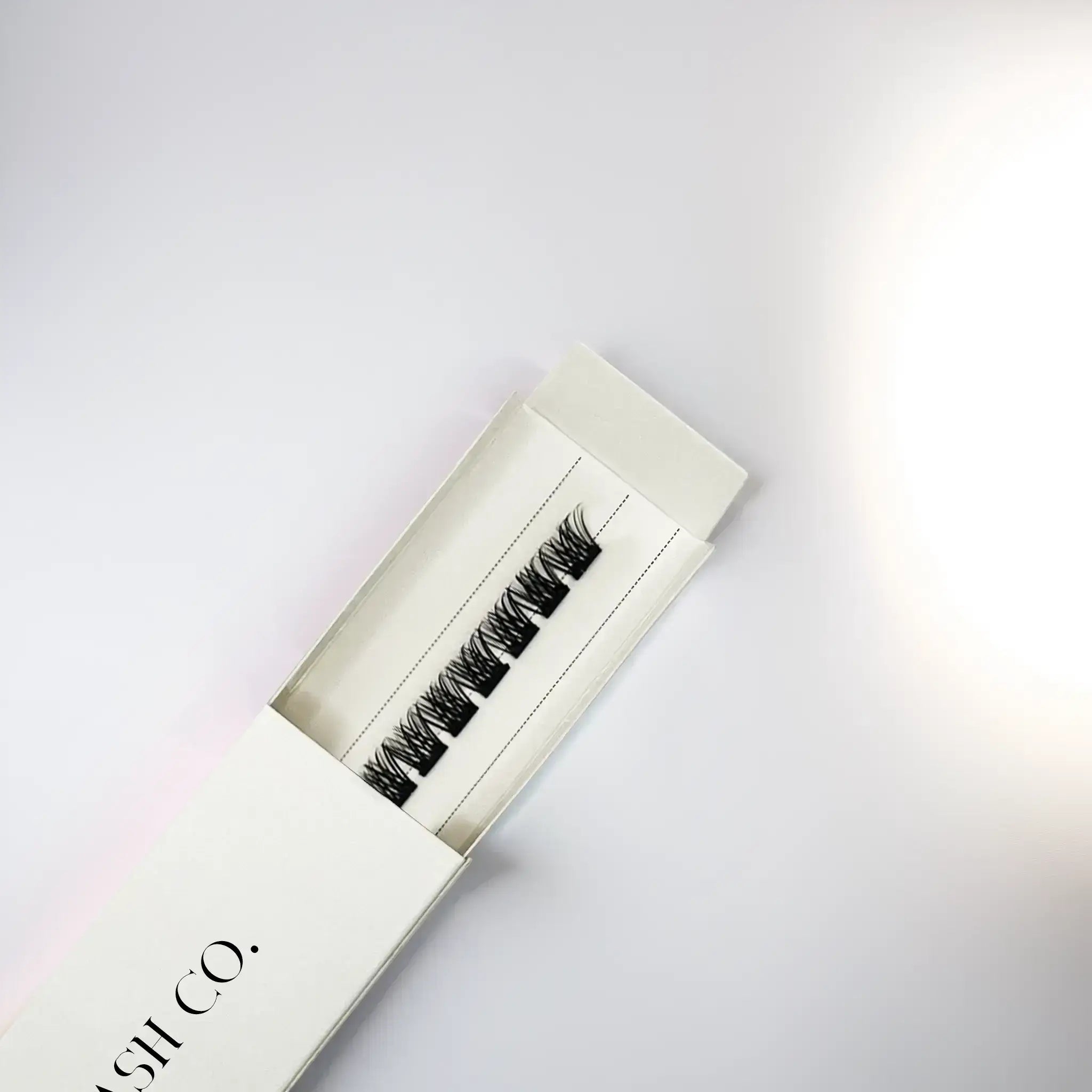 Box of Muse cluster lashes, self adhesive, dramatic false eyelashes for bold volume and glam looks.